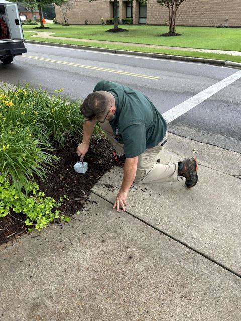 Person working on electric box